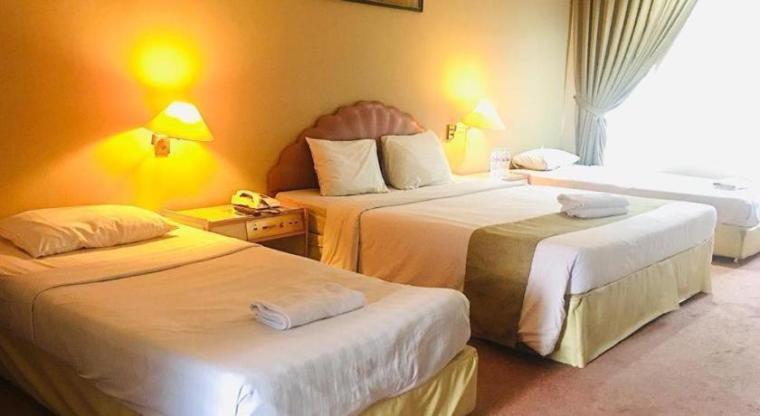 New Grand Park Hotel Surabaya Bagian luar foto